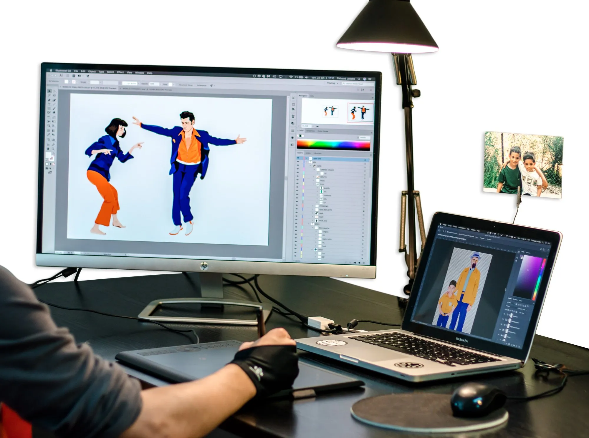 The Lovers artwork being drawn on a screen, Father & Son on the laptop