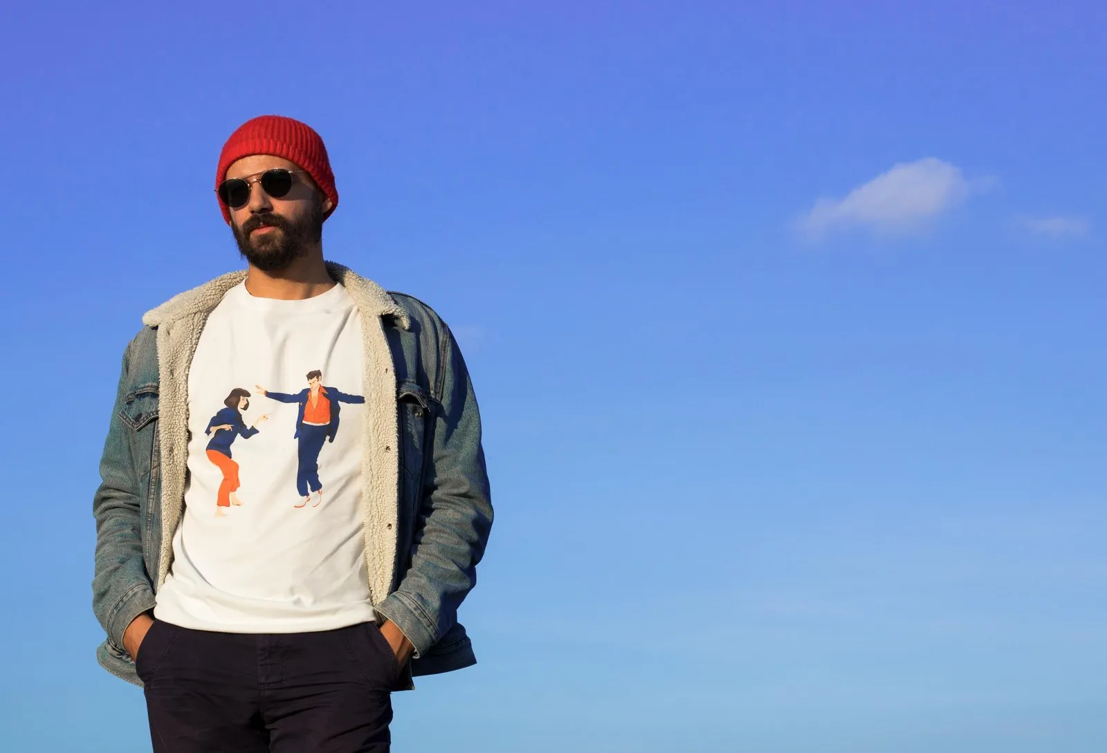 The Lovers tee against a blue sky